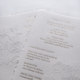 Exklusive Hochzeitseinladung auf Büttenpapier mit Heißfolienprägung und Blindprägung